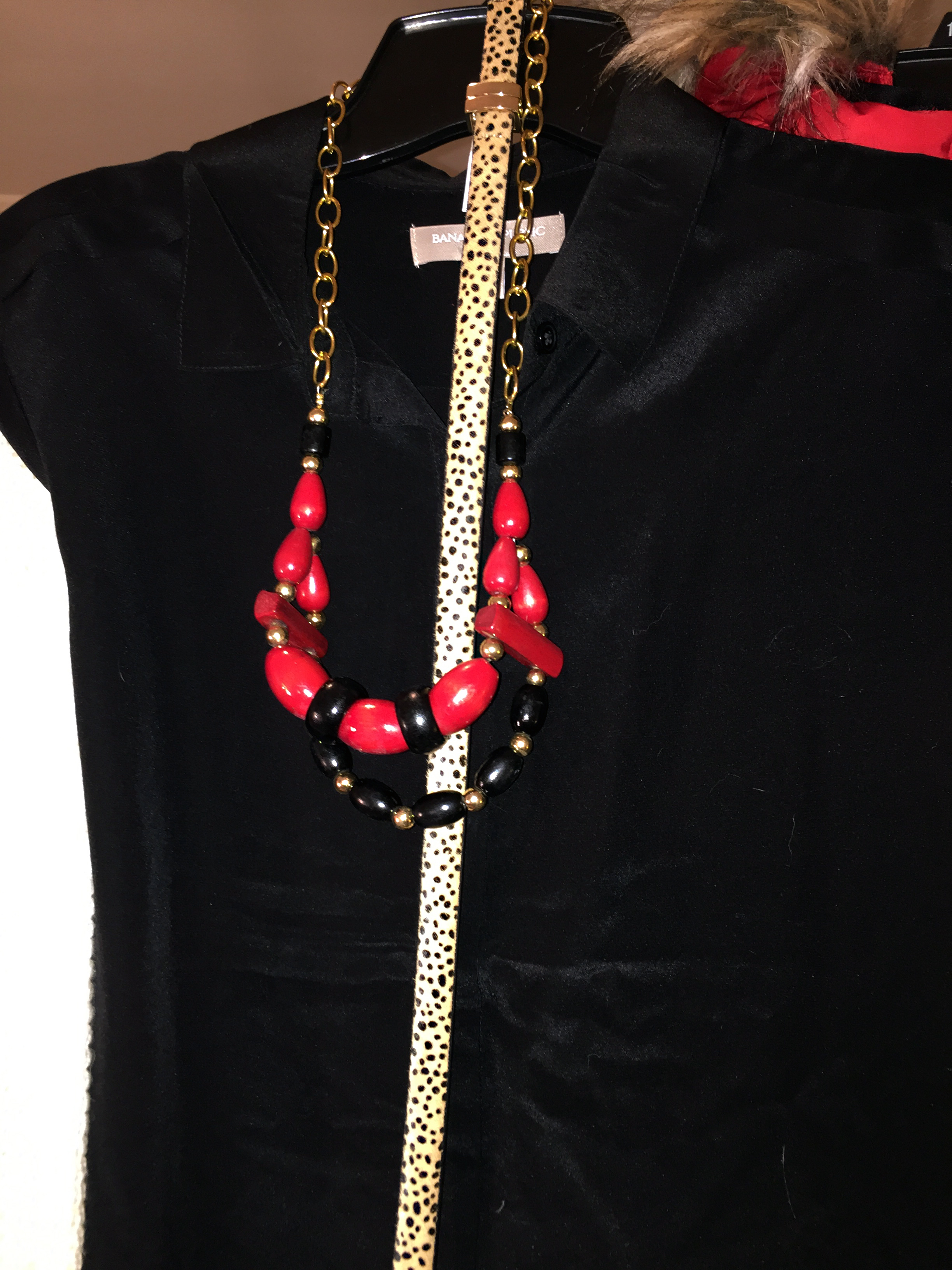 banana republic blouse with red necklace