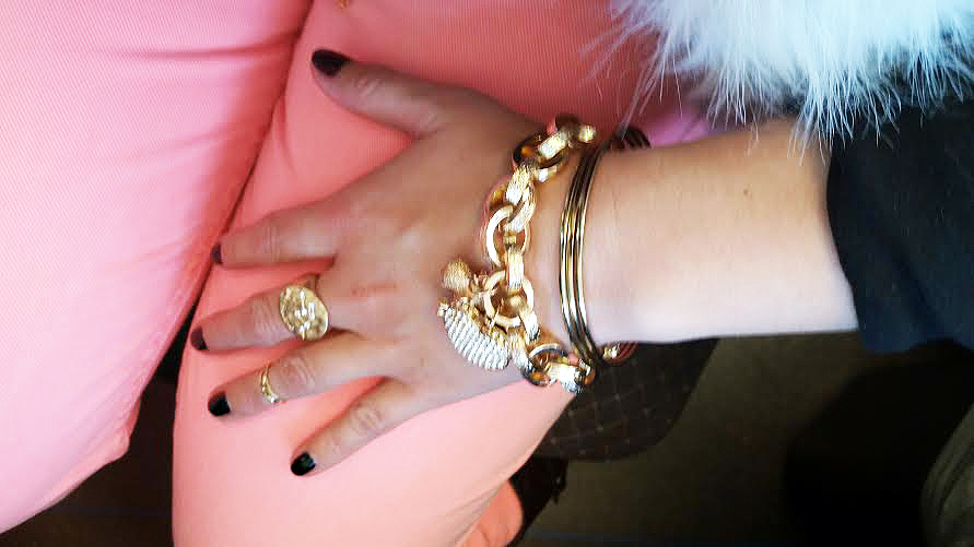 gold bracelet pink vest